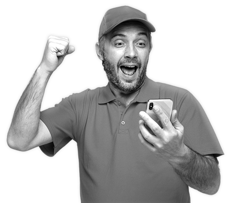 A HVAC owner holding a cell phone and raising his fist happy that the Growth Accelerator Program has helped him with HVAC lead generation, growth, and HVAC digital marketing.